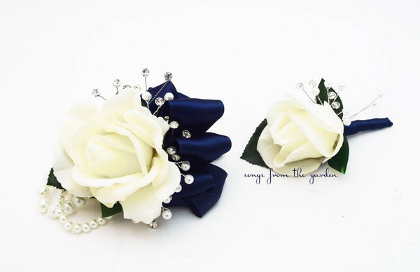 White Navy Real Touch Rose Wedding Boutonniere & Wedding Corsage with Songs from the Garden White Navy Real Touch Rose Wedding Boutonniere & Wedding Corsage with Songs from the Garden